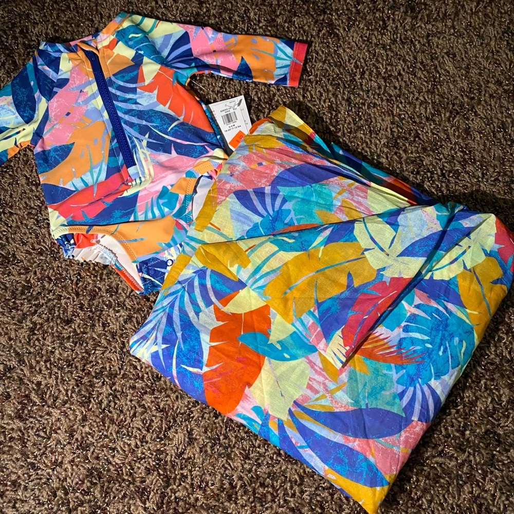 Old Navy Baby 0-3 month swim suit, with matching adult sarong cover up.
